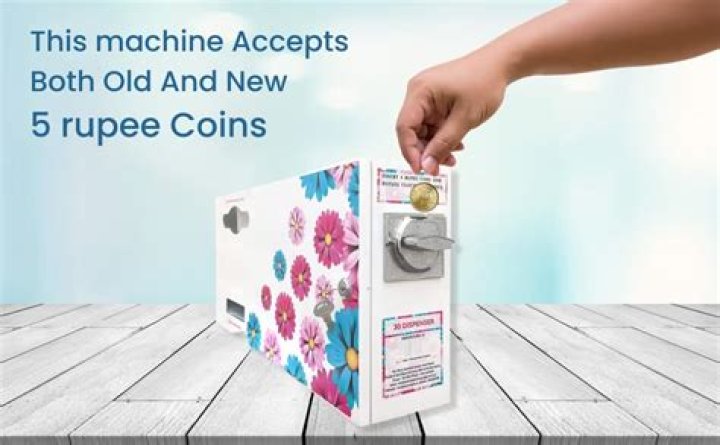 How do you use a sanitary pad vending machine?