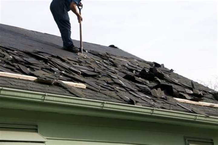 How much does it cost to dispose of roof shingles?